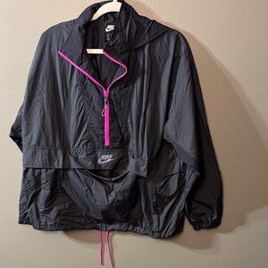 NIKE Black Half Zip up Front Pocket packable jacket. Size M
